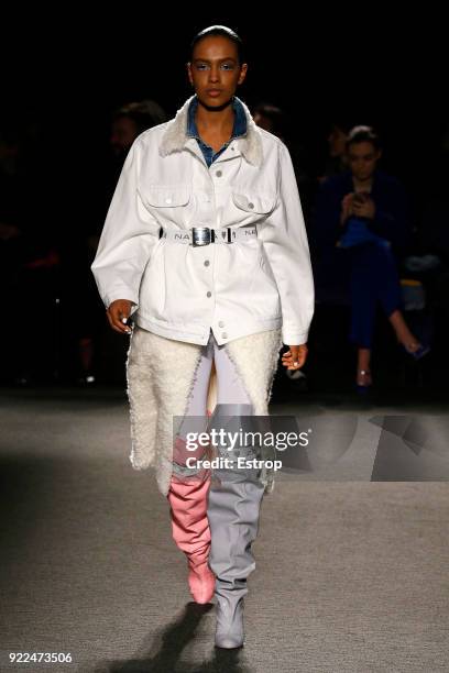 Model walks the runway at the Natasha Zinko show during London Fashion Week February 2018 at The Queen Elizabeth II Conference Centre on February 20,...