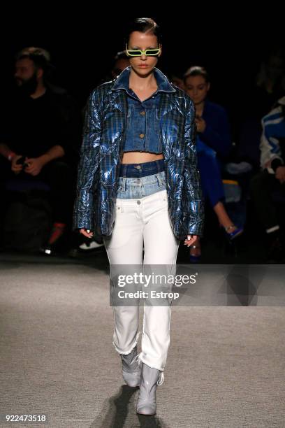 Model walks the runway at the Natasha Zinko show during London Fashion Week February 2018 at The Queen Elizabeth II Conference Centre on February 20,...