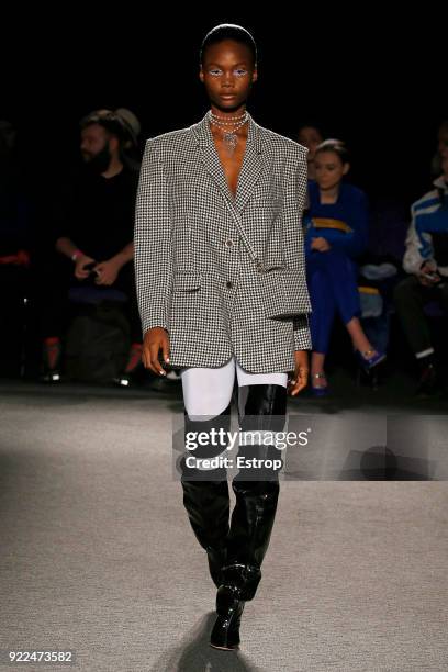 Model walks the runway at the Natasha Zinko show during London Fashion Week February 2018 at The Queen Elizabeth II Conference Centre on February 20,...