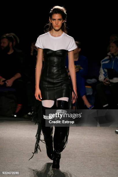 Model walks the runway at the Natasha Zinko show during London Fashion Week February 2018 at The Queen Elizabeth II Conference Centre on February 20,...