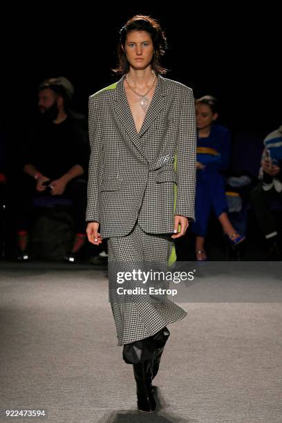 Model walks the runway at the Natasha Zinko show during London Fashion Week February 2018 at The Queen Elizabeth II Conference Centre on February 20,...