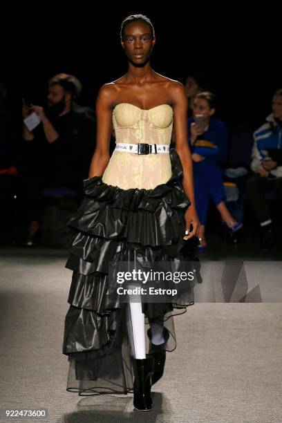 Model walks the runway at the Natasha Zinko show during London Fashion Week February 2018 at The Queen Elizabeth II Conference Centre on February 20,...