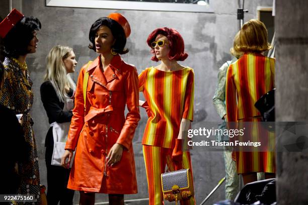 Models are seen backstage ahead of the Moschino show during Milan Fashion Week Fall/Winter 2018/19 on February 21, 2018 in Milan, Italy.