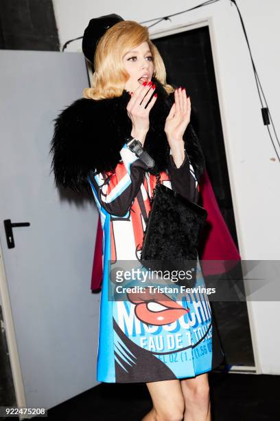 Model si seen backstage ahead of the Moschino show during Milan Fashion Week Fall/Winter 2018/19 on February 21, 2018 in Milan, Italy.
