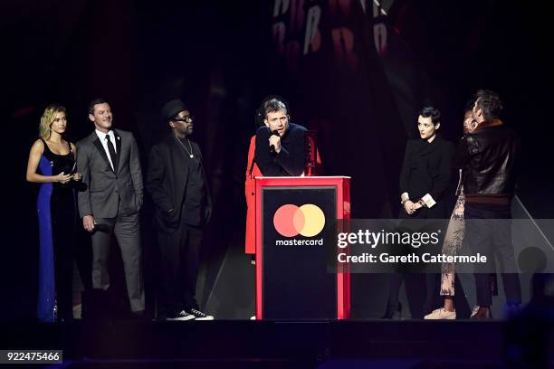 Hailey Baldwin and Luke Evans present Damon Albarn and Gorillaz with the British Group award at The BRIT Awards 2018 held at The O2 Arena on February...