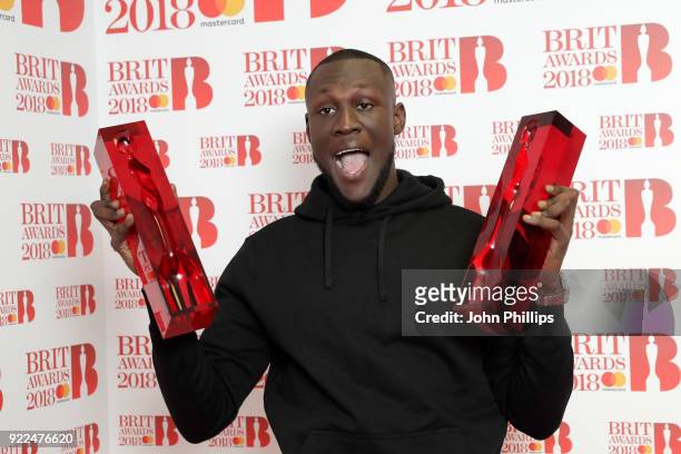 Stormzy, winner of the British Album of the Year and British Male Solo Artist awards, poses in the winners room during The BRIT Awards 2018 held at...