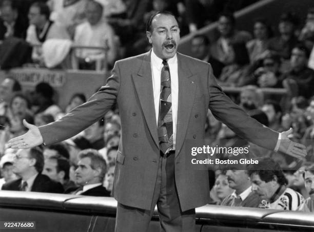 Boston Celtics coach Chris Ford screams as he watches the game against the Los Angeles Clippers at the Boston Garden, Jan. 14, 1994.