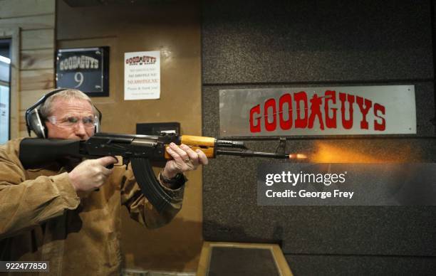 Vince Warner, fires an AK-47 with a bump stock installed at Good Guys Gun and Range, on February 21, 2018 in Orem, Utah. The bump stock is a device...