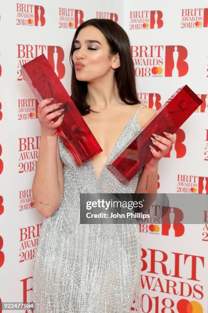 Dua Lipa, winner of the British Female Solo Artist and British Breakthrough act awards, poses in the winners room during The BRIT Awards 2018 held at...