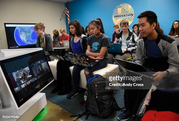 Highlands Ranch high school freshman Jaeden Toy, right, talks with students at Arickaree High School via high-tech video conferencing equipment,...