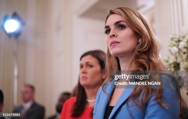 White House Communications Director Hope Hicks watches as US President Donald Trump takes part in a listening session on gun violence with teachers...