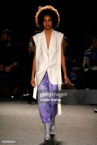 Model walks the runway at the Natasha Zinko show during London Fashion Week February 2018 at The Queen Elizabeth II Conference Centre on February 20,...