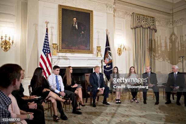 President Donald Trump, center, speaks during a listening session on gun violence with high school students, teachers and parents in the State Dining...