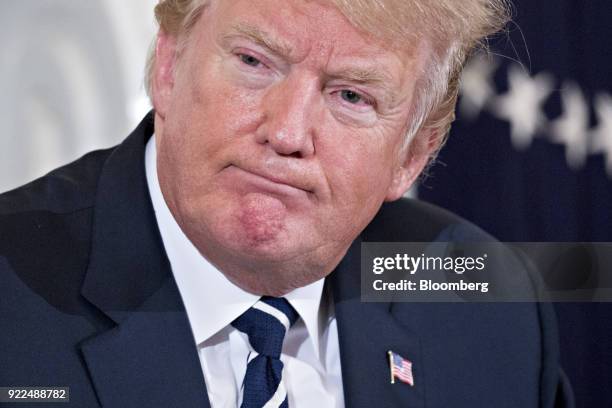 President Donald Trump participates in a listening session on gun violence with high school students, teachers and parents in the State Dining Room...