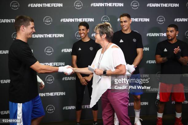 New Zealand Olympic Committee CEO Kereyn Smith congratulates boxer Ryan Scaife during the New Zealand Commonwealth Games Boxing Team Announcement at...