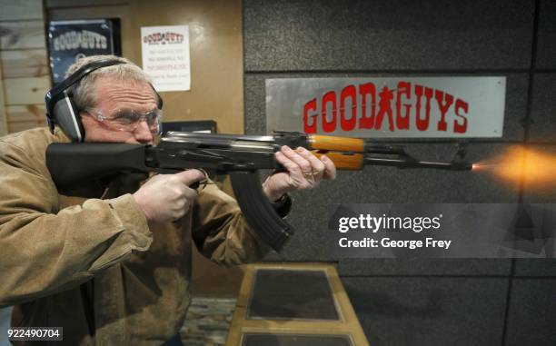 Vince Warner fires an AK-47 with a bump stock installed at Good Guys Gun and Range on February 21, 2018 in Orem, Utah. The bump stock is a device...