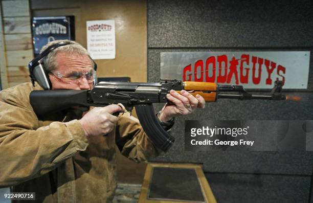 Vince Warner fires an AK-47 with a bump stock installed at Good Guys Gun and Range on February 21, 2018 in Orem, Utah. The bump stock is a device...