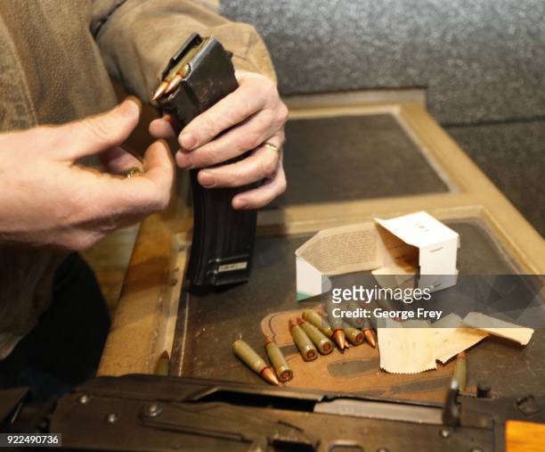 62X39mm round are loaded into 30 round magazine for an AK-47 at Good Guys Gun and Range on February 21, 2018 in Orem, Utah. The bump stock is a...