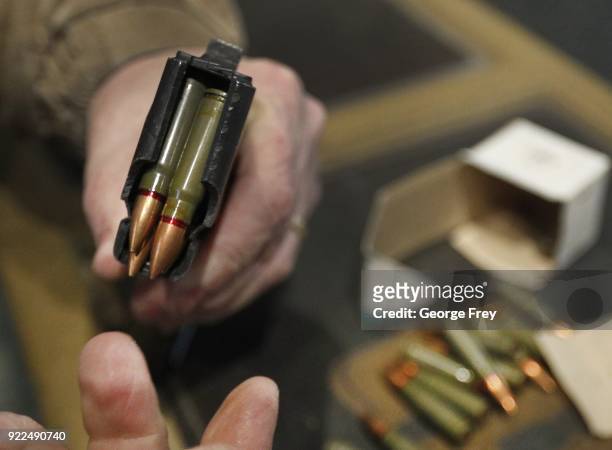 62X39mm round are loaded into 30 round magazine for an AK-47 at Good Guys Gun and Range on February 21, 2018 in Orem, Utah. The bump stock is a...