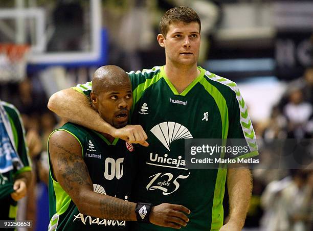 Omar Cook,#00 and Robert Archibald, #21 of Unicaja celebrate during the Euroleague Basketball Regular Season Game Day 1 match between Partizan...