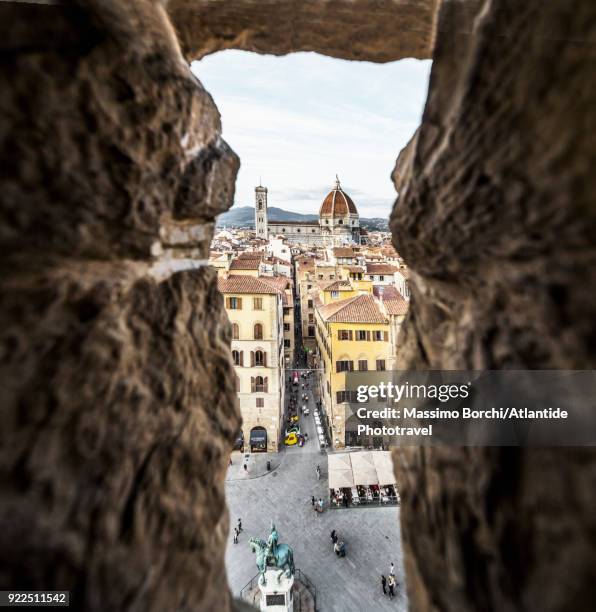 view of the town with santa maria del fiore cathedral and giotto bell tower - bell tower tower stock-fotos und bilder