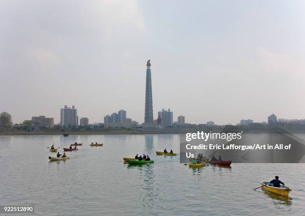 Boats on the Taedong river with the Juche tower in the background, Pyongan Province, Pyongyang, North Korea on April 13, 2008 in Pyongyang, North...