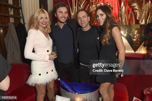 Holly Willoughby, Ben Caring, Daniel Baldwin, and Ben Caring's wife attend the Warner Music & CIROC BRIT Awards 2018 after-party at Freemasons Hall...