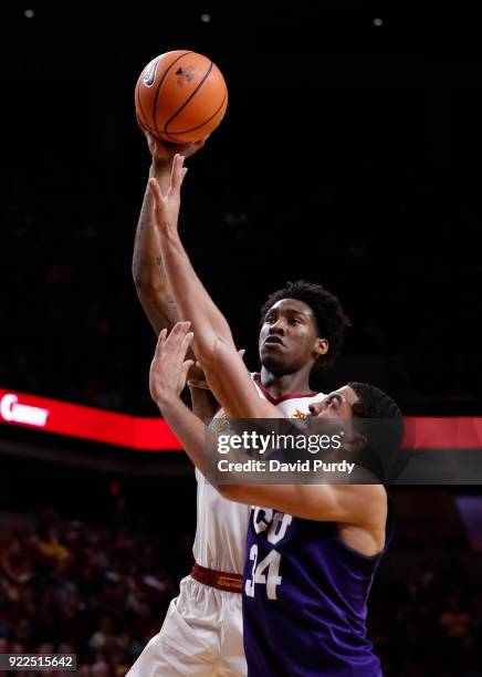 Zoran Talley Jr. #23 of the Iowa State Cyclones shoots the ball as Angus McWilliam of the TCU Horned Frogs blocks in the first half of play at Hilton...
