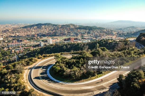 aerial view of rabassada road in the collserola natural park with barcelona in the background. - cycling drone bildbanksfoton och bilder