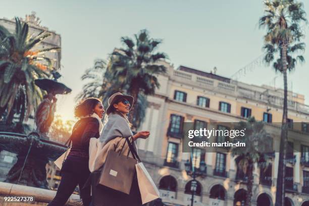 friends enjoying a shopping weekend in barcelona - the ramblas stock pictures, royalty-free photos & images