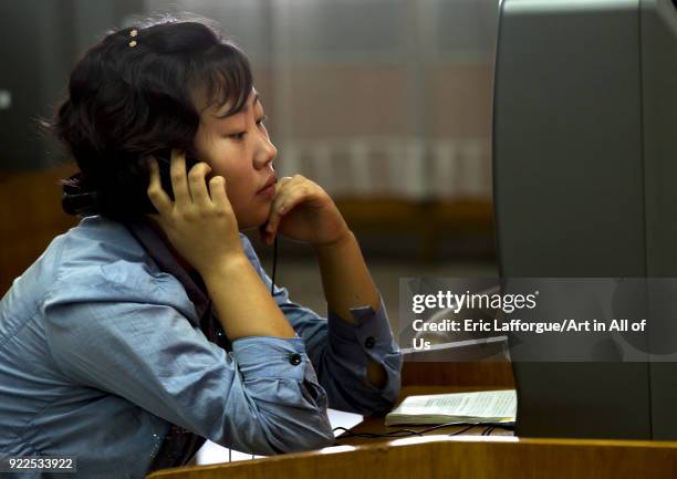 North Korean woman watching a dvd at the Grand people's study house, Pyongan Province, Pyongyang, North Korea on September 14, 2012 in Pyongyang,...