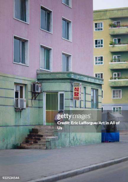 North Korean woman using mobile phone in the street, Pyongan Province, Pyongyang, North Korea on September 9, 2011 in Pyongyang, North Korea.