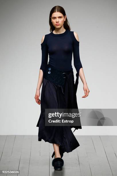 Model walks the runway at the Teatum Jones show during London Fashion Week February 2018 at BFC Show Space on February 20, 2018 in London, England.