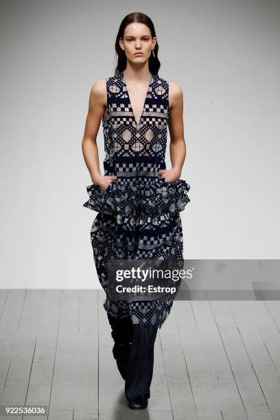 Model walks the runway at the Teatum Jones show during London Fashion Week February 2018 at BFC Show Space on February 20, 2018 in London, England.