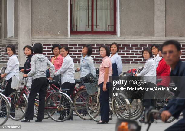 North Korean women going to work with bicycles, North Hwanghae Province, Kaesong, North Korea on September 11, 2011 in Kaesong, North Korea.