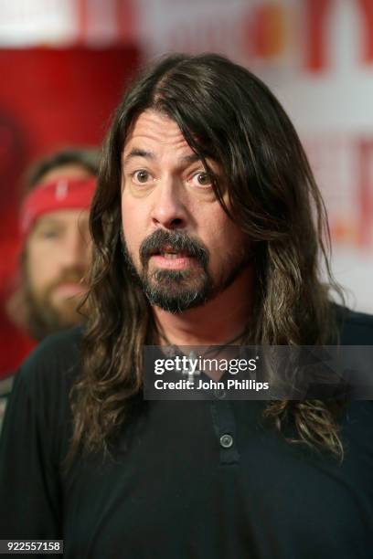 Dave Grohl of Foo Fighters, winner of the Best International Group award, poses in the winners room during The BRIT Awards 2018 held at The O2 Arena...