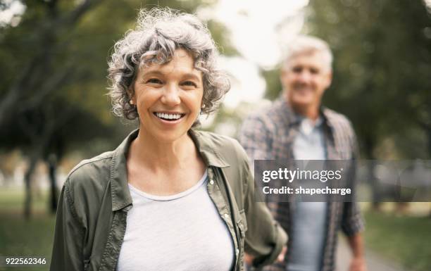 i’ll go anywhere as long as we’re together - senior woman gray hair stock pictures, royalty-free photos & images