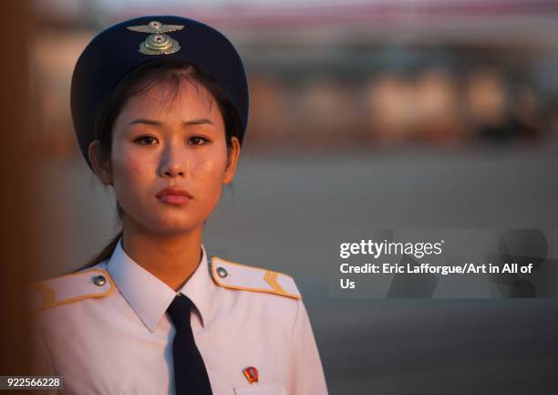 Cute North Korean airport employee, Pyongan Province, Pyongyang, North Korea on September 19, 2011 in Pyongyang, North Korea.