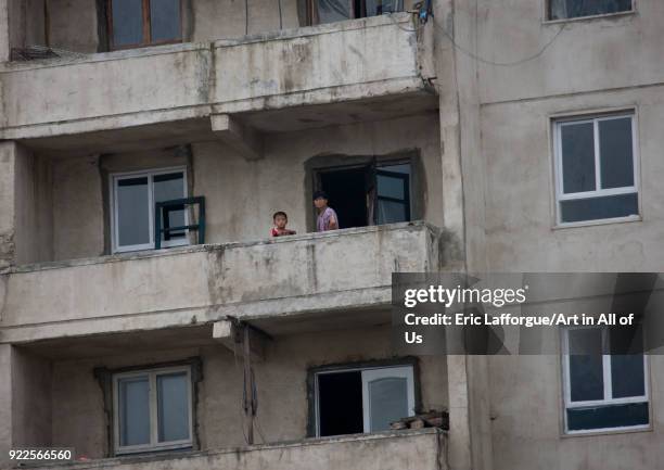 North Korean people on the balcony of an apartement, North Hwanghae Province, Kaesong, North Korea on September 11, 2011 in Kaesong, North Korea.