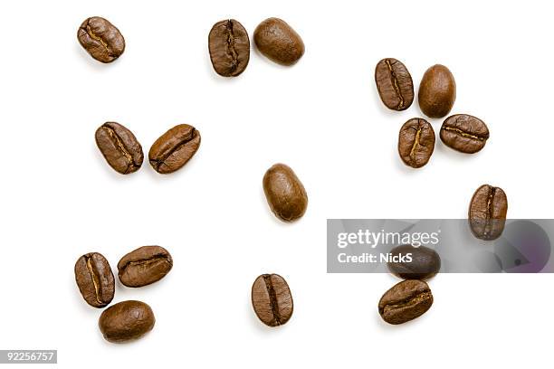 coffee beans - geroosterde koffieboon stockfoto's en -beelden