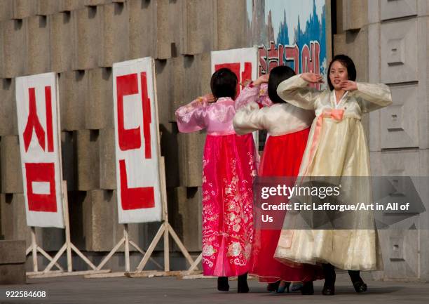 North Korean young adults during a mass dance performance in front of buildings on military foundation day, Pyongan Province, Pyongyang, North Korea...