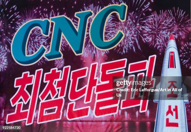 Propaganda poster with a missile and the computer numerical control program, Pyongan Province, Pyongyang, North Korea on April 26, 2010 in Pyongyang,...