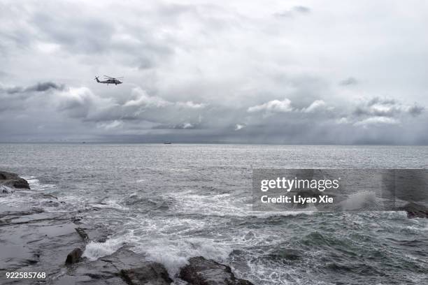 helicopter over sea - surf rescue stock pictures, royalty-free photos & images