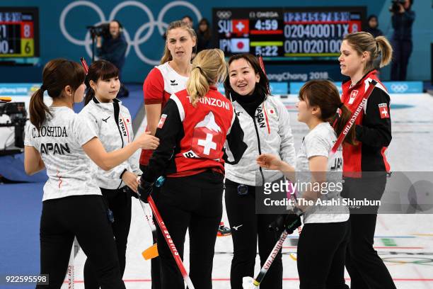 Players shake hands after the Women's Curling round robin session 12 between Switzerland and Japan on day twelve of the Pyeongchang Winter Olympics...
