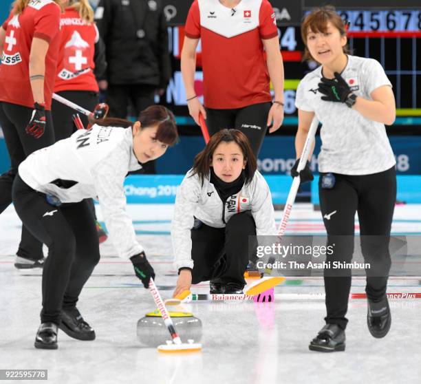 Satsuki Fujisawa of Japan delivers the stone in the 1st end during the Women's Curling round robin session 12 between Switzerland and Japan on day...