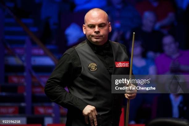 Stuart Bingham of England reacts during his first round match against Mark J. Williams of Wales on day three of 2018 Ladbrokes World Grand Prix at...