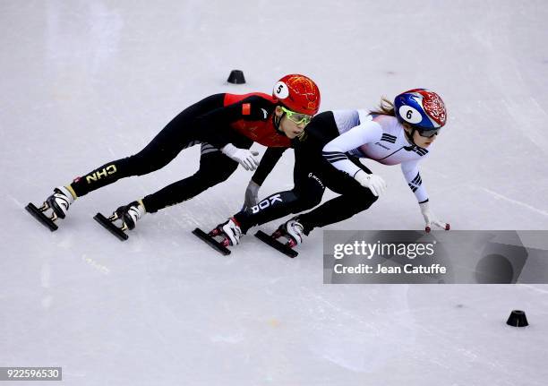 Kexin Fan of China and Minjeong Choi of South Korea during Short Track Speed Skating Ladies 3000m Relay Final on day eleven of the PyeongChang 2018...