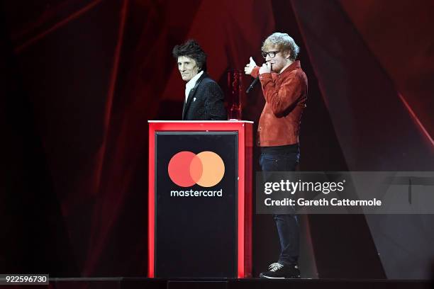 Ronnie Wood presentes Ed Sheeran with the winner of the Global Success Award, on stage at The BRIT Awards 2018 held at The O2 Arena on February 21,...