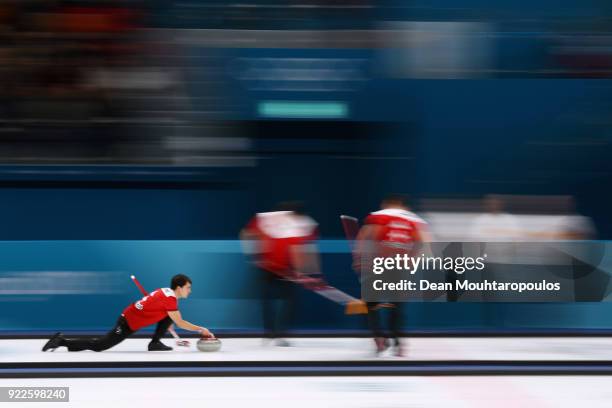 Peter de Cruz, Valentin Tanner, Claudio Patz and Benoit Schwarz of Switzerland compete in the Curling Men's Tie-breaker against Great Britain on day...