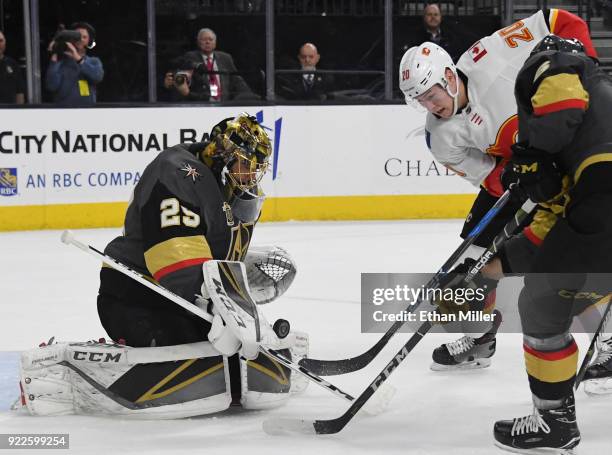 Marc-Andre Fleury of the Vegas Golden Knights blocks a shot by Curtis Lazar of the Calgary Flames in the first period of their game at T-Mobile Arena...